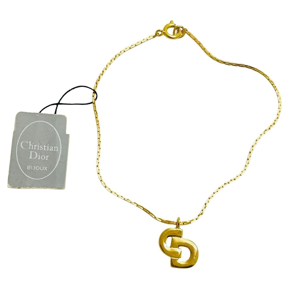 Vintage CHRISTIAN DIOR logo gold plated designer runway bracelet with tag